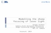 Modelling the sharp focusing of laser light